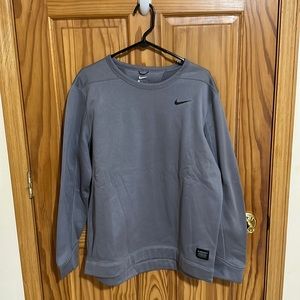 Men’s Nike golf crew neck sweatshirt.